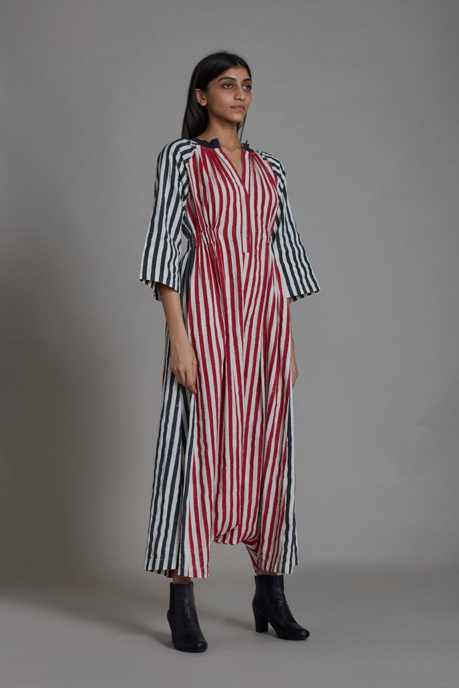 A Model Wearing Multicolor Pure Cotton Uno Stripe Jumpsuit- Red With Black, curated by Only Ethikal