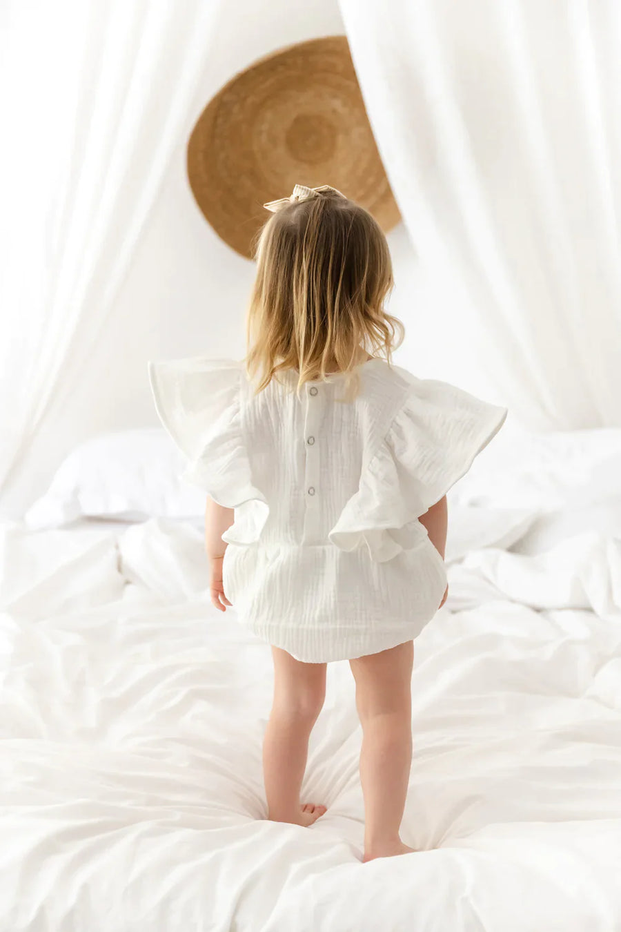 A Model Wearing Beige Pure Cotton Skyler Organic muslin romper
, curated by Only Ethikal