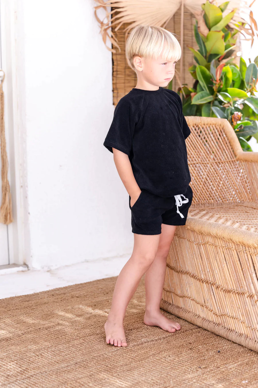 A Model Wearing Black Organic Cotton Siblings matching set-Terry towelling(black), curated by Only Ethikal