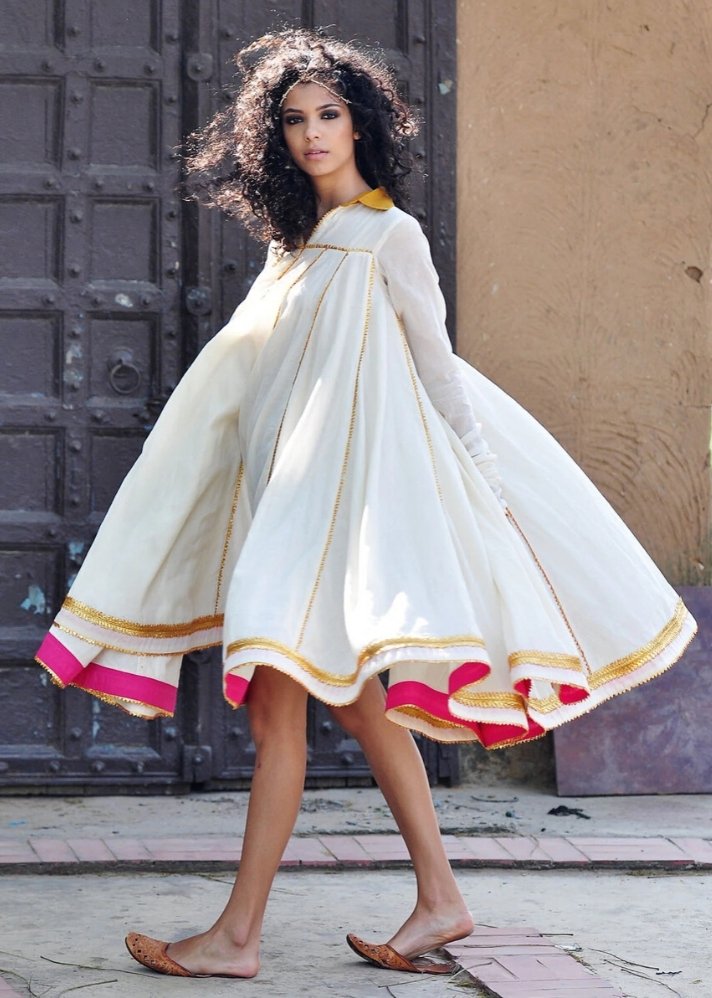 young woman in stylish Ivory Ornamental dress made of sustainable materials curated by onlyethikal