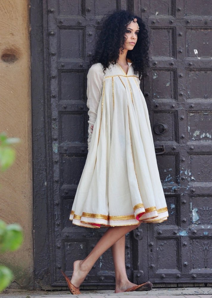 young woman in stylish Ivory Ornamental dress made of sustainable materials curated by onlyethikal