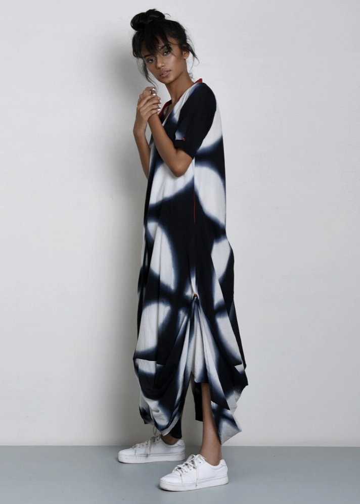 This Kharakapas handloom cotton maxi dress is made of black and white shibori dyed fabric and curated by Ethikal.