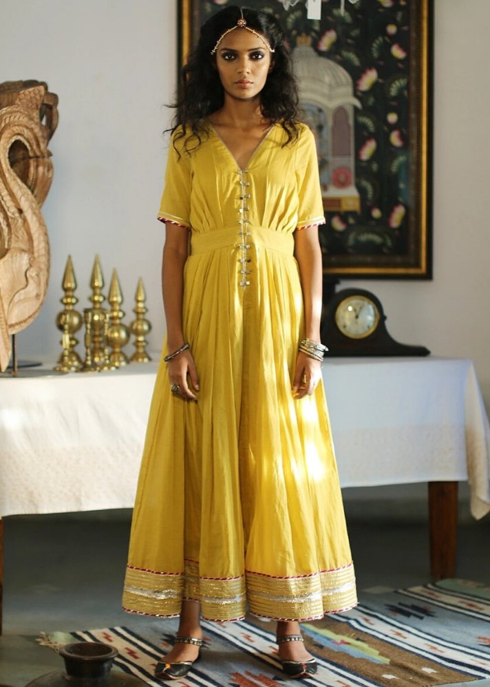 young woman in stylish Ornamental yellow maxi dress curated by  onlyethikal