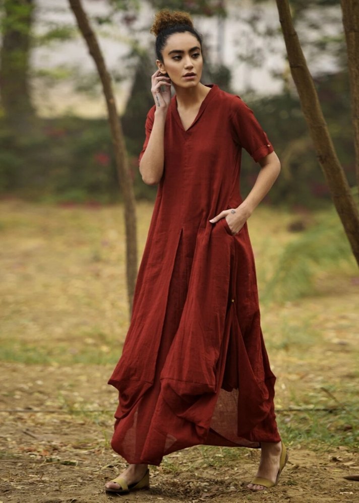 young woman wearing Red cowl and drape dress made of sustainable materials curated by  onlyethikal