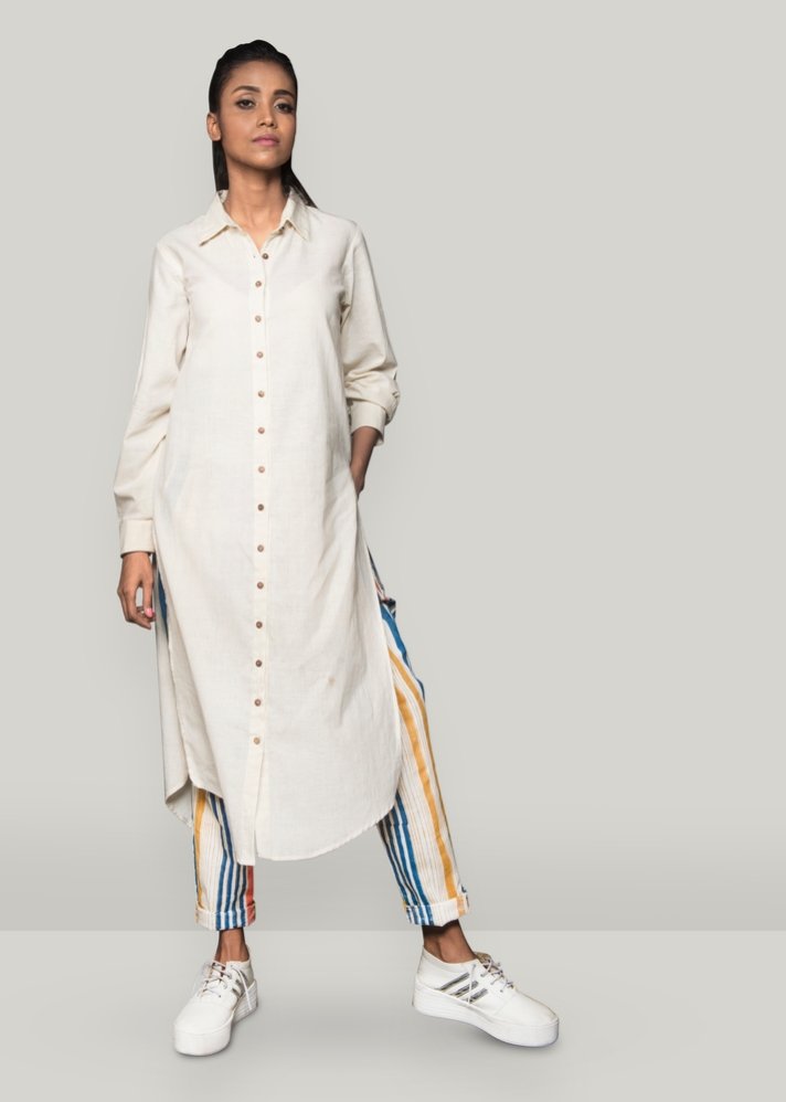 young woman wearing white Shirt dress set with pants curated by onlyethikal