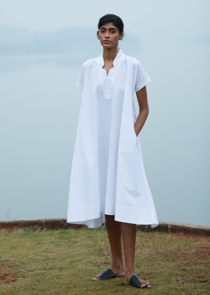 young woman in white Tent dress made of soft Cotton curated by onlyethikal